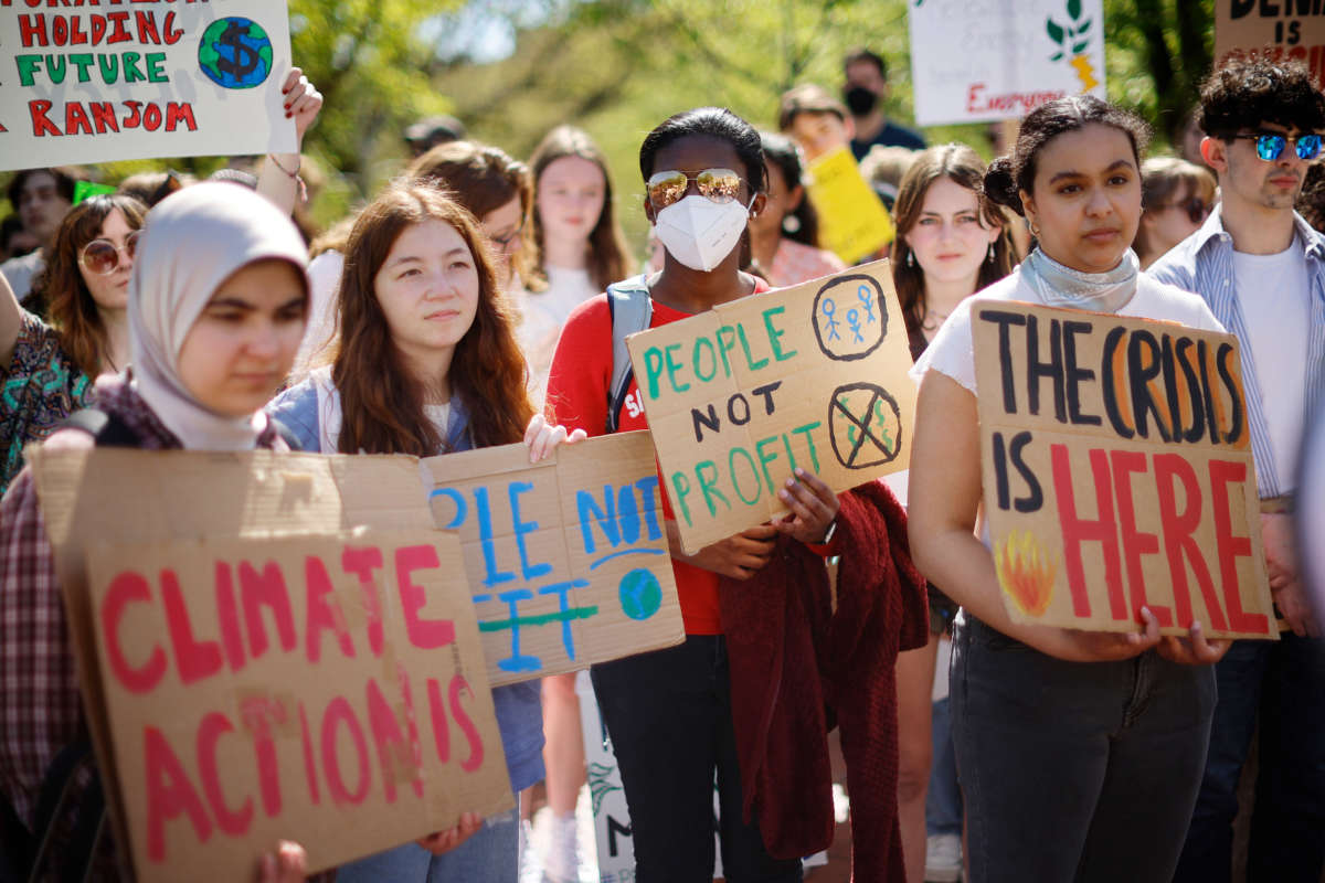 Young climate activists stage a rally in Lafayette Park across from the White House on Earth Day on April 22, 2022, in Washington, D.C.