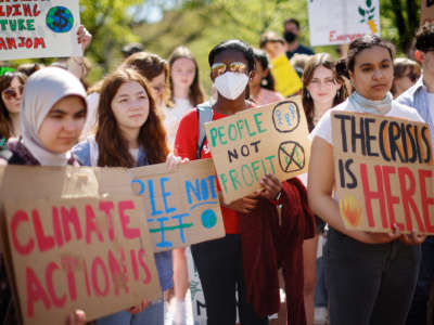 Young climate activists stage a rally in Lafayette Park across from the White House on Earth Day on April 22, 2022, in Washington, D.C.