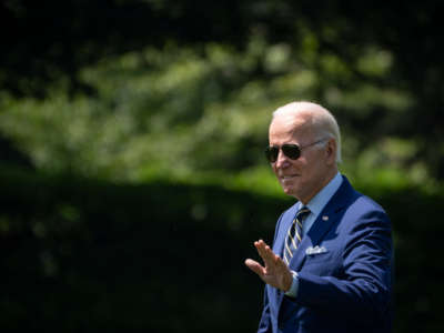 President Joe Biden waves as he walks to Marine One on the South Lawn of the White House July 20, 2022, in Washington, D.C.