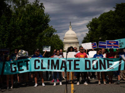 Environmental activists rally near the U.S. Capitol on July 6, 2022, in Washington, D.C.