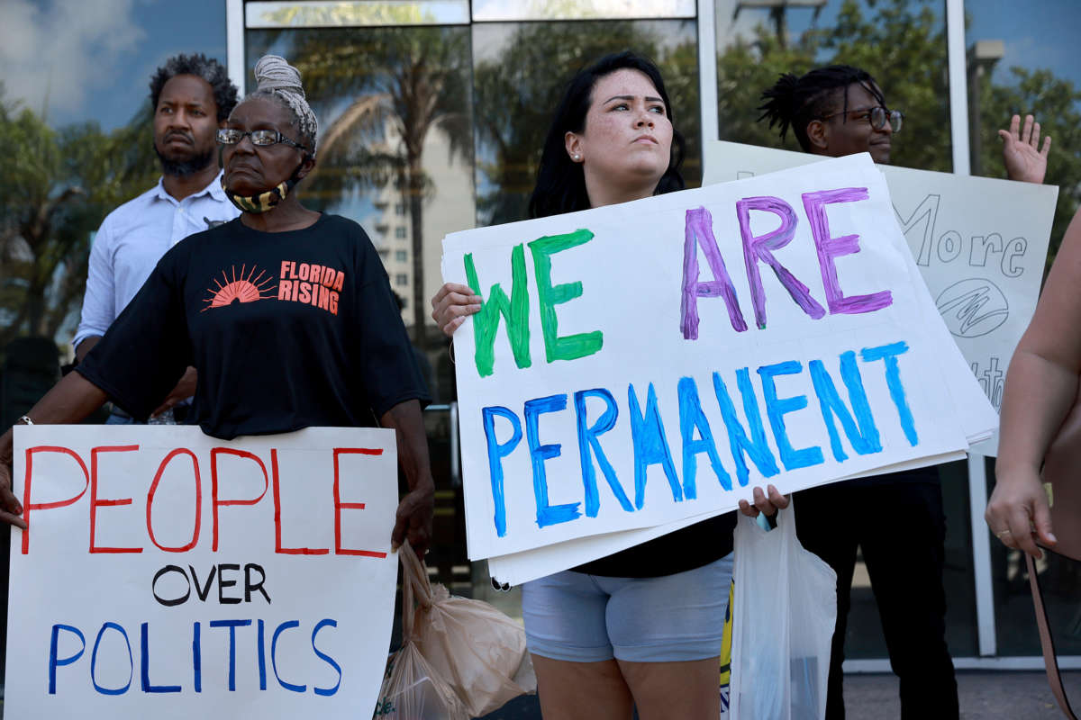 Protesters demonstrate in front of Florida State Senator Ileana Garcia's office after the passage of the Parental Rights in Education bill, known as the "Don't Say Gay" bill, on March 9, 2022, in Miami, Florida.
