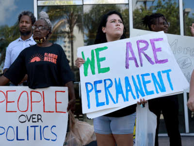 Protesters demonstrate in front of Florida State Senator Ileana Garcia's office after the passage of the Parental Rights in Education bill, known as the "Don't Say Gay" bill, on March 9, 2022, in Miami, Florida.