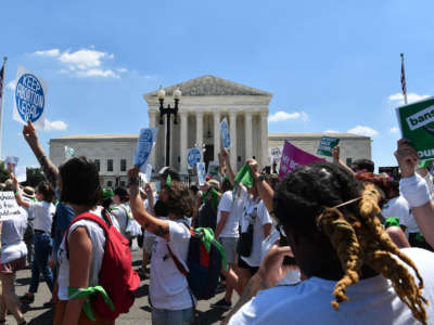 Abortion rights activists rally outside the U.S. Supreme Court after the overturning of Roe v. Wade, in Washington, D.C., on June 30, 2022.