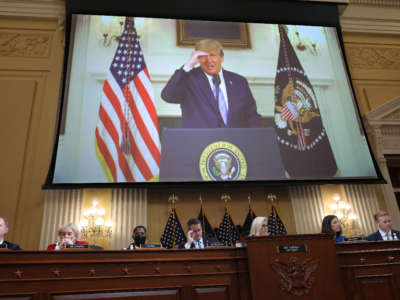 Then-President Donald Trump is seen on a screen as the House Select Committee to Investigate the January 6th Attack on the U.S. Capitol hold a prime-time hearing in the Cannon House Office Building on July 21, 2022, in Washington, D.C.