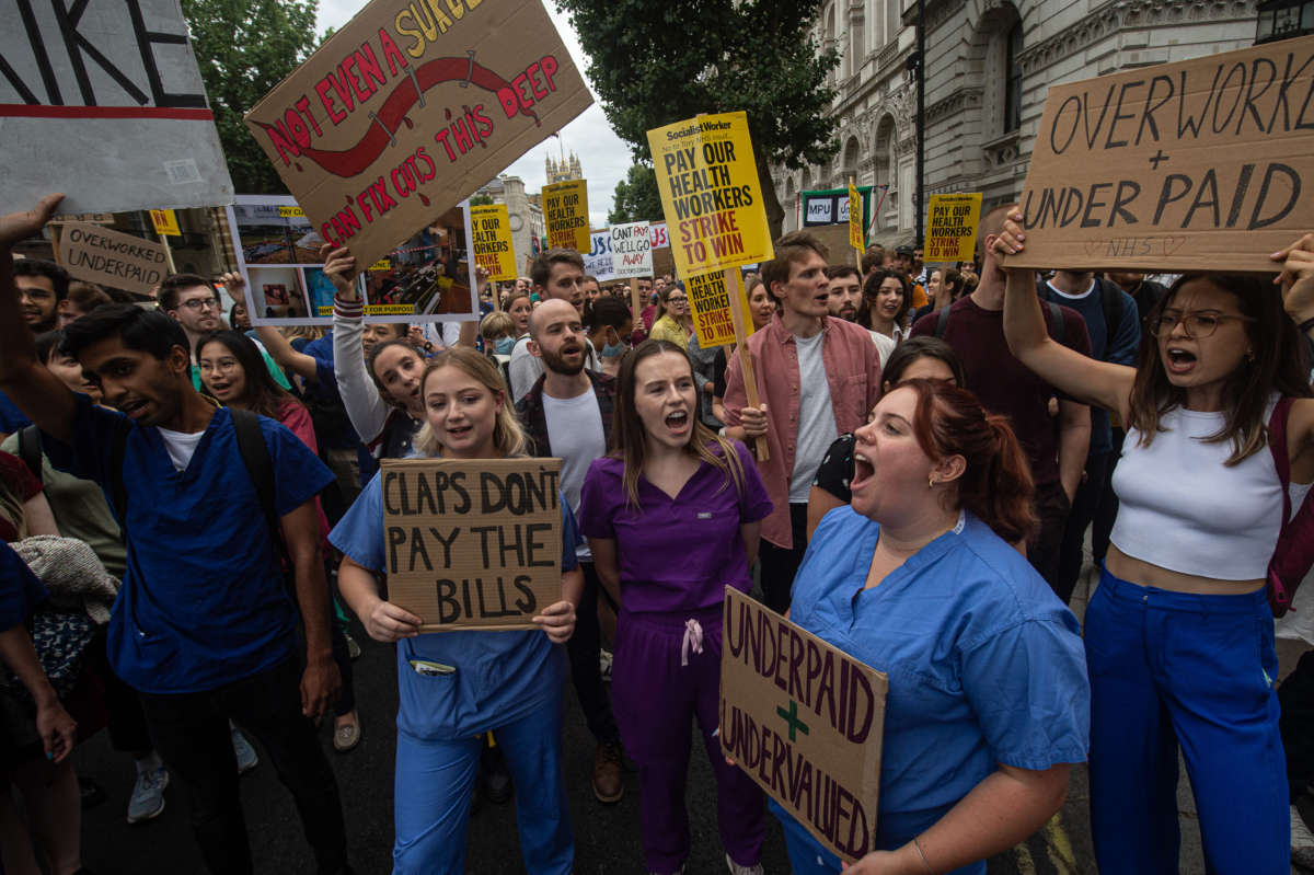 Junior doctors protest outside Downing street blocking part of Whitehall on July 25, 2022, in London, England.