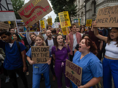 Junior doctors protest outside Downing street blocking part of Whitehall on July 25, 2022, in London, England.