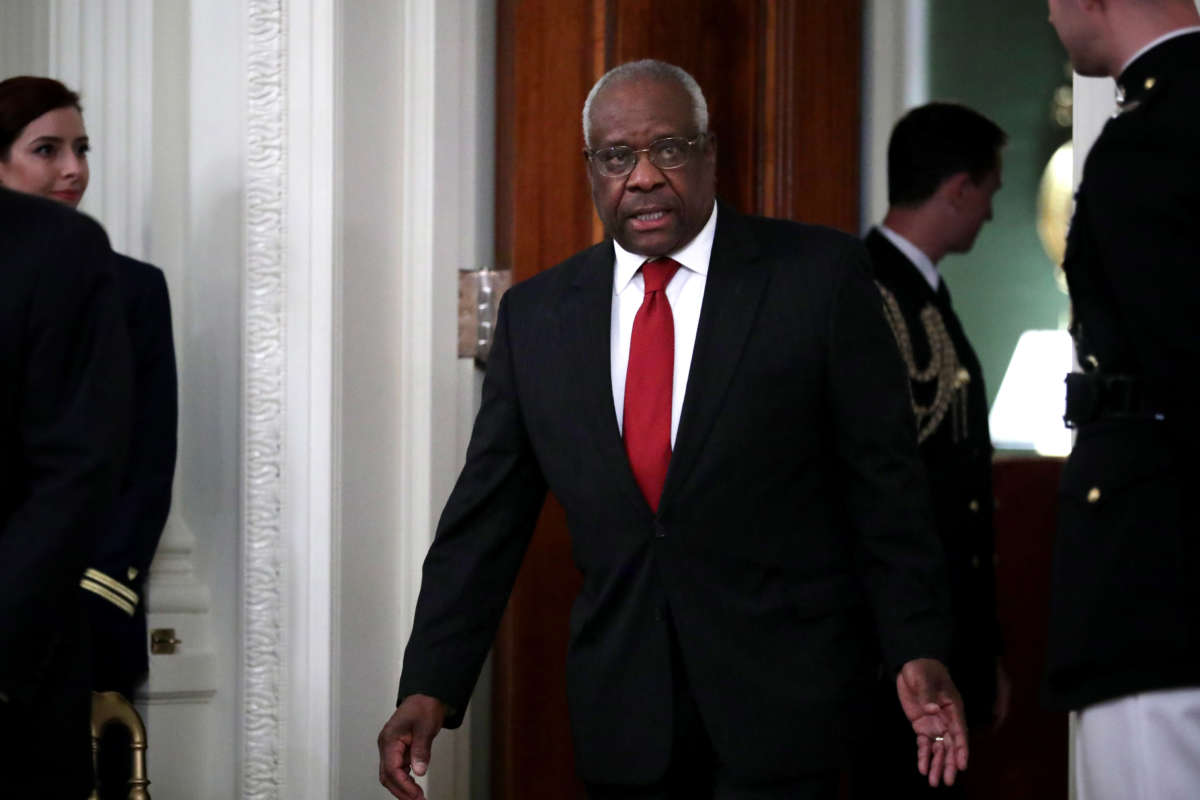 U.S. Supreme Court Associate Justice Clarence Thomas arrives for the ceremonial swearing in of Associate Justice Brett Kavanaugh in the East Room of the White House October 8, 2018, in Washington, D.C.