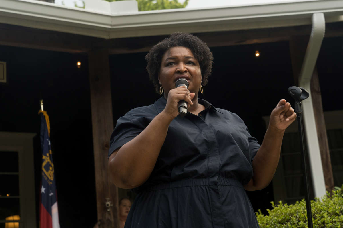 Georgia gubernatorial candidate Stacey Abrams speaks to supporters and members of the Rabun County Democrats group on July 28, 2022, in Clayton, Georgia.