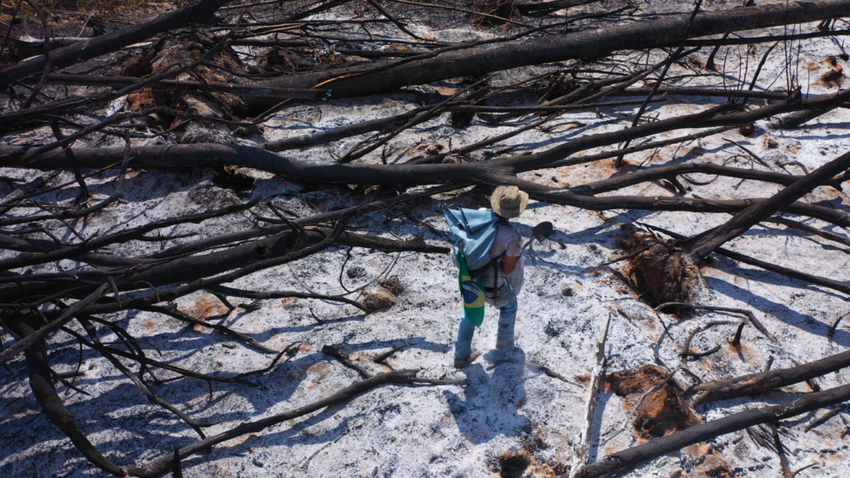 Mundano collecting ashes during the expedition.