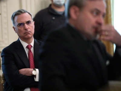 White House Counsel Pat Cipollone listens during a cabinet meeting in the East Room of the White House on May 19, 2020, in Washington, D.C.