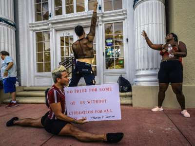 Activists and sex workers participate in a "Slut Walk" in Florida