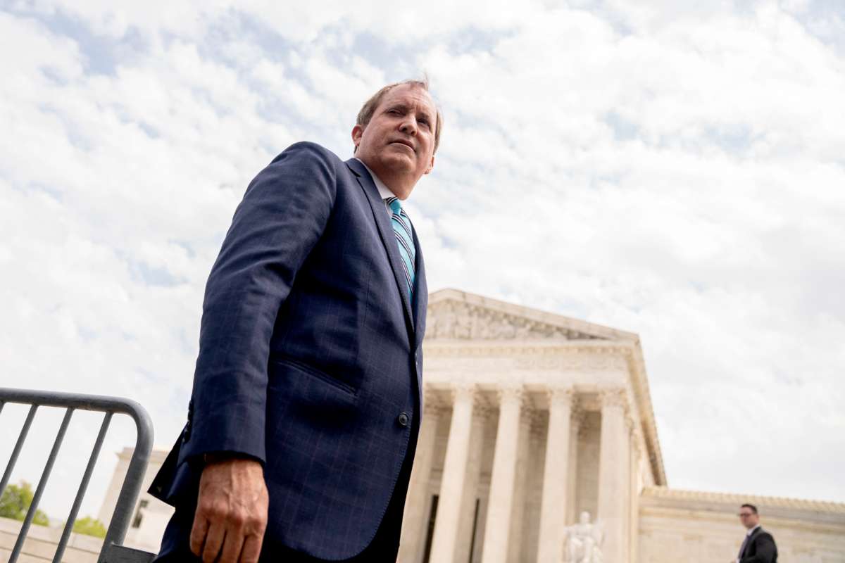 Texas Attorney General Ken Paxton speaks to reporters in front of the Supreme Court in Washington, D.C., on April 26, 2022.