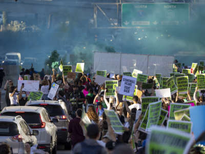 Protesters march to denounce the Supreme Court's decision in the Dobbs v. Jackson Women's Health case on June 24, 2022, in Los Angeles, California.