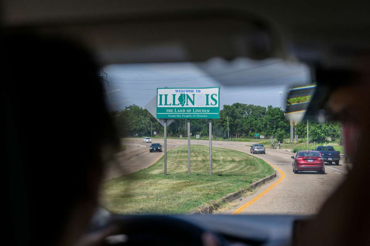 Lori Lamprich, volunteer driver with Midwest Access Coalition, drives her car from St. Louis, Missouri, over the state border to Illinois, on June 25, 2022. Lamprich drives abortion seekers across the Mississippi River to Illinois, where abortion remains legal.