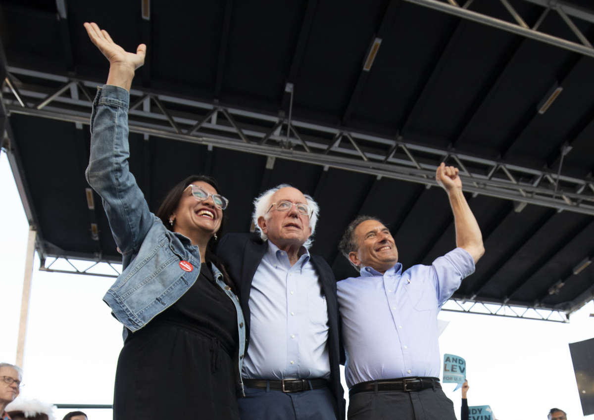Sen. Bernie Sanders campaigns for Michigan Democratic Rep. Andy Levin and Rep. Rashida Tlaib at a rally on July 29, 2022 in Pontiac, Michigan. The Michigan Primary is on August 2.