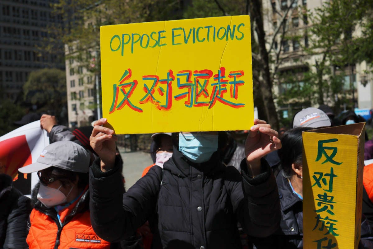 People gather for a rally protesting rent hikes at City Hall Park on April 28, 2022, in New York City.