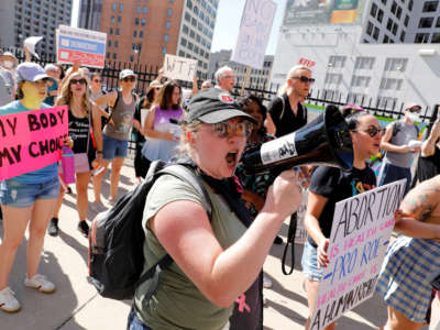 Abortion rights activists protest outside the U.S. Federal Courthouse in Detroit, Michigan, on June 24, 2022.