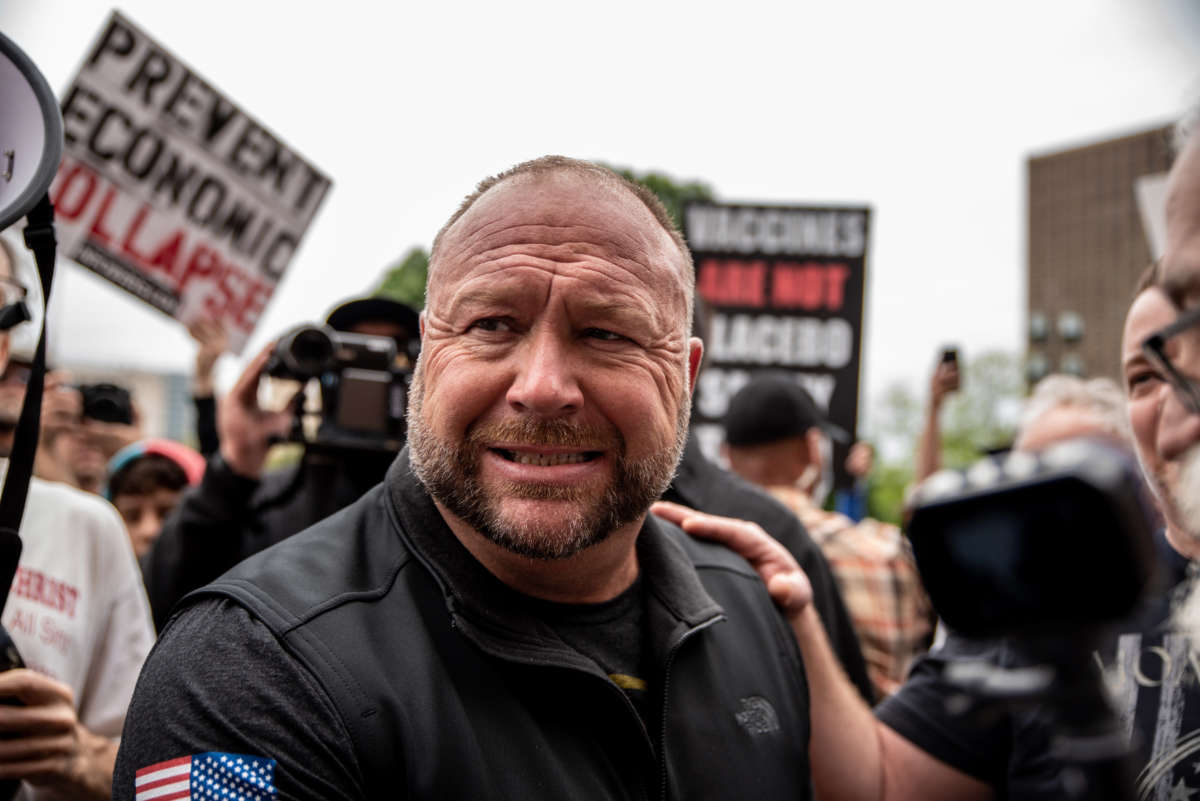 Infowars founder Alex Jones interacts with supporters at the Texas State Capital building on April 18, 2020, in Austin, Texas.