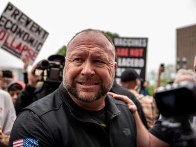 Infowars founder Alex Jones interacts with supporters at the Texas State Capital building on April 18, 2020, in Austin, Texas.