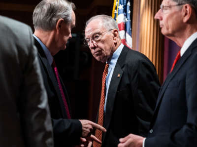 From left, Sens. Mike Crapo, Chuck Grassley and John Barrasso arrive for a news conference on the Democrat's policies, in the U.S. Capitol on August 3, 2022.
