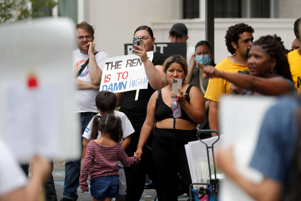 Tenants and activists take part in a rally at the Delta Pines apartment complex in Antioch, California, on June 22, 2022.