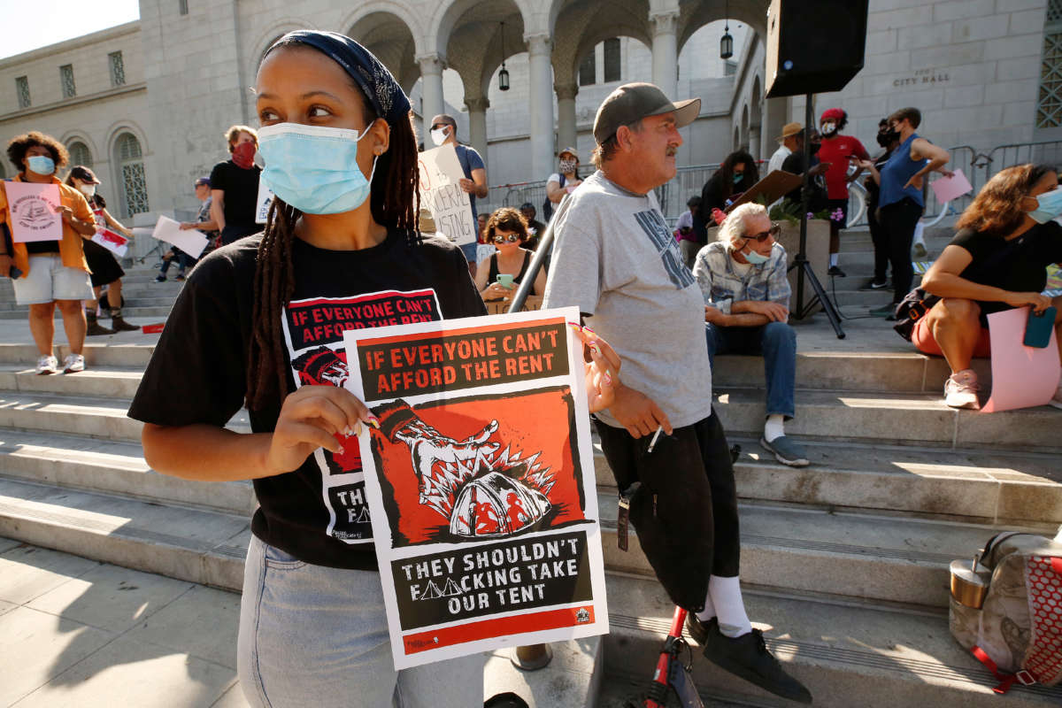 People gather for The Right to REST without ARREST Rally and Press Conference on the steps of Los Angeles City Hall on July 28, 2021, in Los Angeles, California.