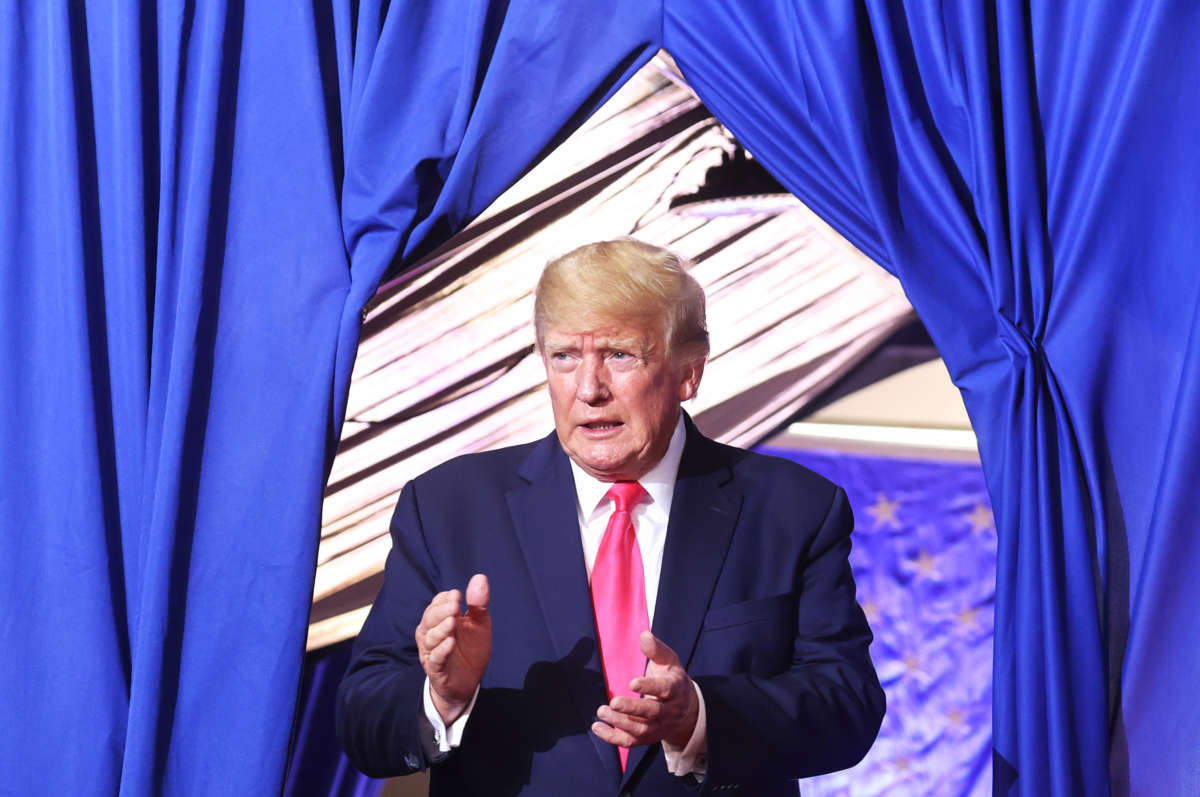 Former President Donald Trump enters a rally in support of Arizona GOP candidates on July 22, 2022, in Prescott Valley, Arizona.