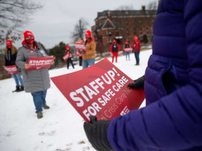 Nurses gather in front of Maine Medical Center to demand increased protections in their work environments. The rally was one of many National Nurses United (NNU) events across the country on January 13, 2022.