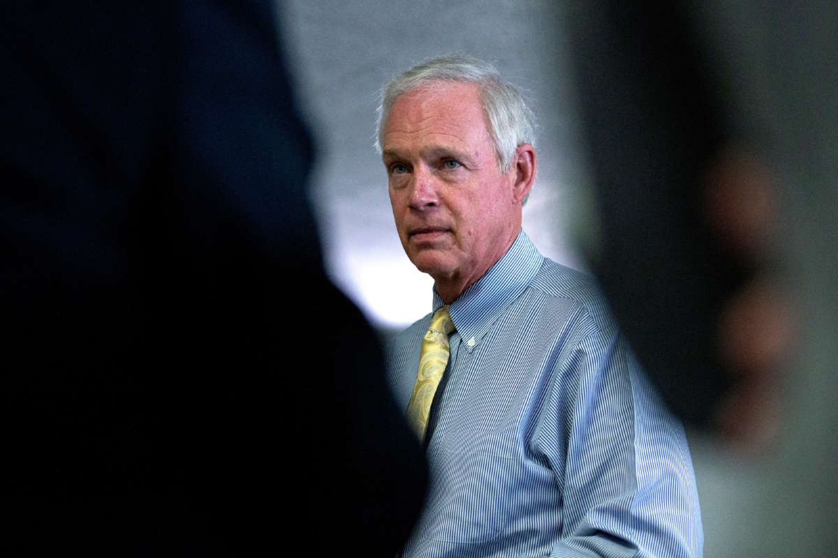 Sen. Ron Johnson speaks to members of the media as he arrives for the weekly Senate Republican policy luncheon in the Hart Senate Office Building on June 30, 2020, in Washington, D.C.