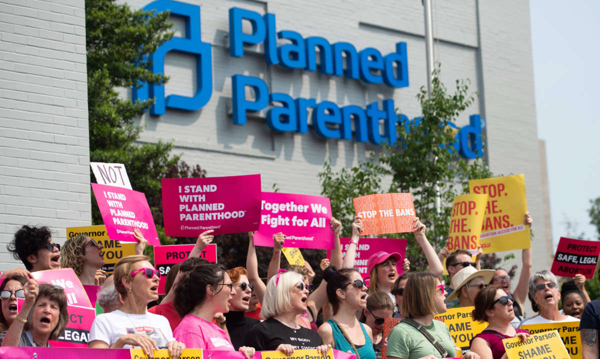 Pro-choice supporters and staff of Planned Parenthood hold a rally outside the Planned Parenthood Reproductive Health Services Center in St. Louis, Missouri, on May 31, 2019.