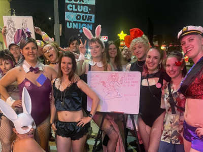 Dancers and supporters take part in a picket line outside of Star Garden Topless Dive Bar in North Hollywood.