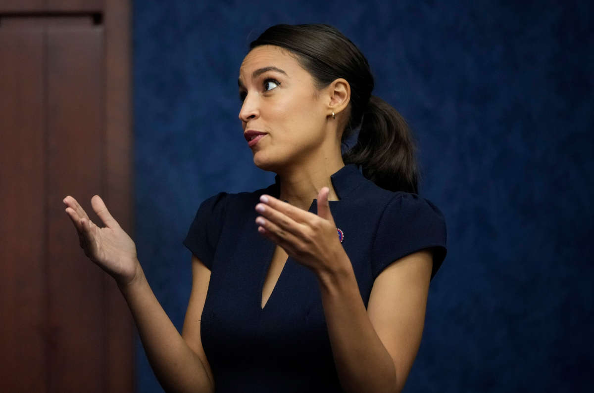 Rep. Alexandria Ocasio-Cortez gestures at the U.S. Capitol on June 23, 2021, in Washington, D.C.