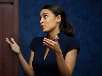 Rep. Alexandria Ocasio-Cortez gestures at the U.S. Capitol on June 23, 2021, in Washington, D.C.