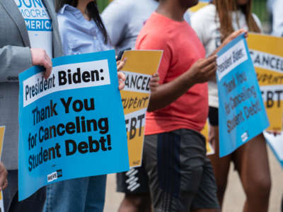 Student loan debt activists rally outside the White House a day after President Biden announced a plan that would cancel $10,000 in student loan debt for those making less than $125,000 a year in Washington, D.C., on August 25, 2022.