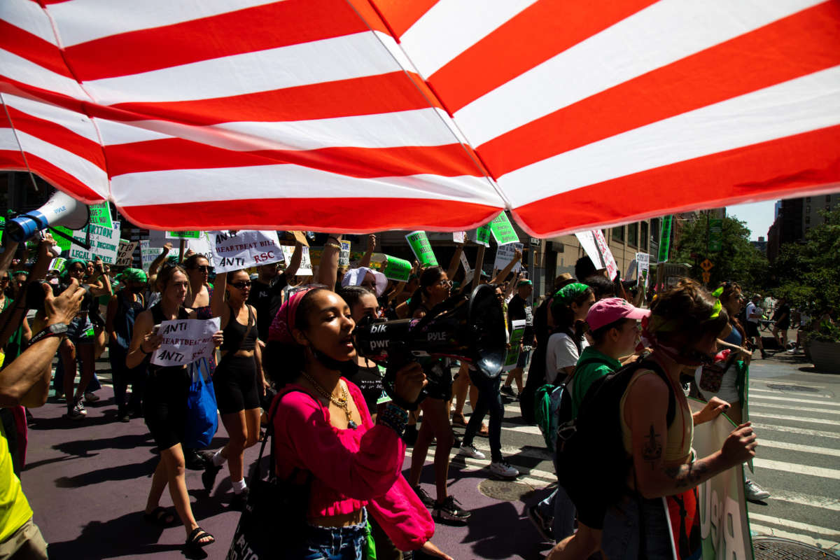 Demonstrators march during a protest against the Supreme Court's overturning of the Roe v. Wade abortion-rights ruling in New York on July 4, 2022.