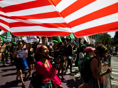 Demonstrators march during a protest against the Supreme Court's overturning of the Roe v. Wade abortion-rights ruling in New York on July 4, 2022.