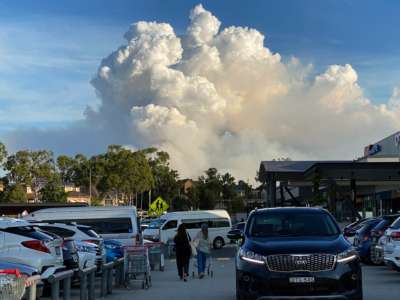 Smoke fills the sky as Sydney is enveloped in a thick bank of hazardous bushfire smoke forcing authorities in Australia's most populous city to scale back controlled forest burning nearby on May 2, 2021.