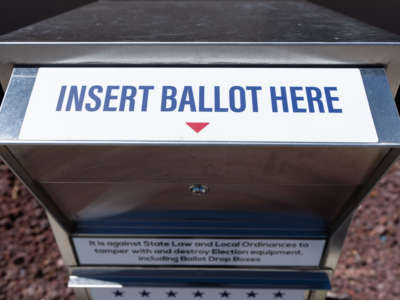 A Coconino County ballot drop box stands next to City Hall in Williams, Arizona, on the first day of early voting for the primary election on July 6, 2022.