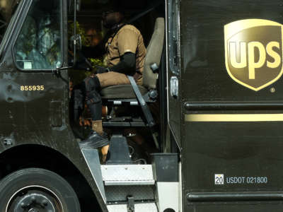 A UPS (United Parcel Service) driver operates a delivery vehicle on February 1, 2022. in Los Angeles, California.