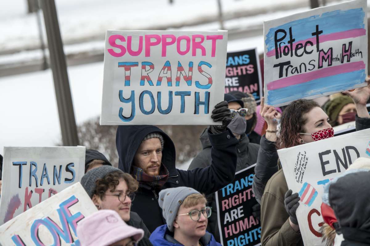 Protest sign saying "Support Trans Youth"