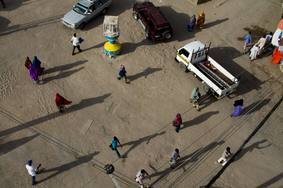 People cross the street in downtown Hargeisa, Somalia.