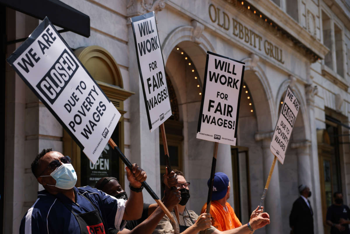 Activists with One Fair Wage participate in a “Wage Strike" demonstration outside of the Old Ebbitt Grill restaurant on May 26th, 2021 in Washington, D.C.