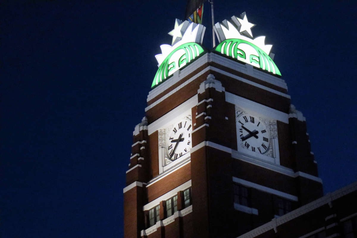 Starbucks headquarters clock tower at night