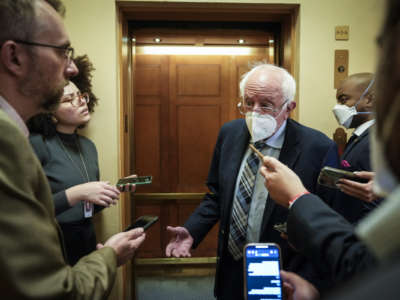 Sen. Bernie Sanders (I-Vermont) speaks to reporters on his way to a vote at the U.S. Capitol September 12, 2022 in Washington, D.C.