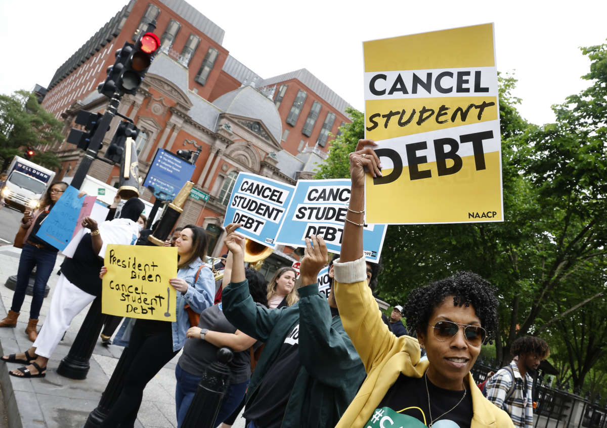 Student loan borrowers gather near The White House to tell President Biden to cancel student debt on May 12, 2020 in Washington, D.C.