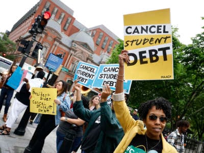 Student loan borrowers gather near The White House to tell President Biden to cancel student debt on May 12, 2020 in Washington, D.C.