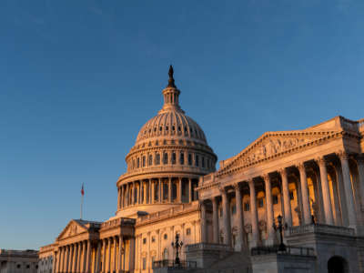 The U.S. Capitol dome is lit by the morning sun on March 14, 2022.