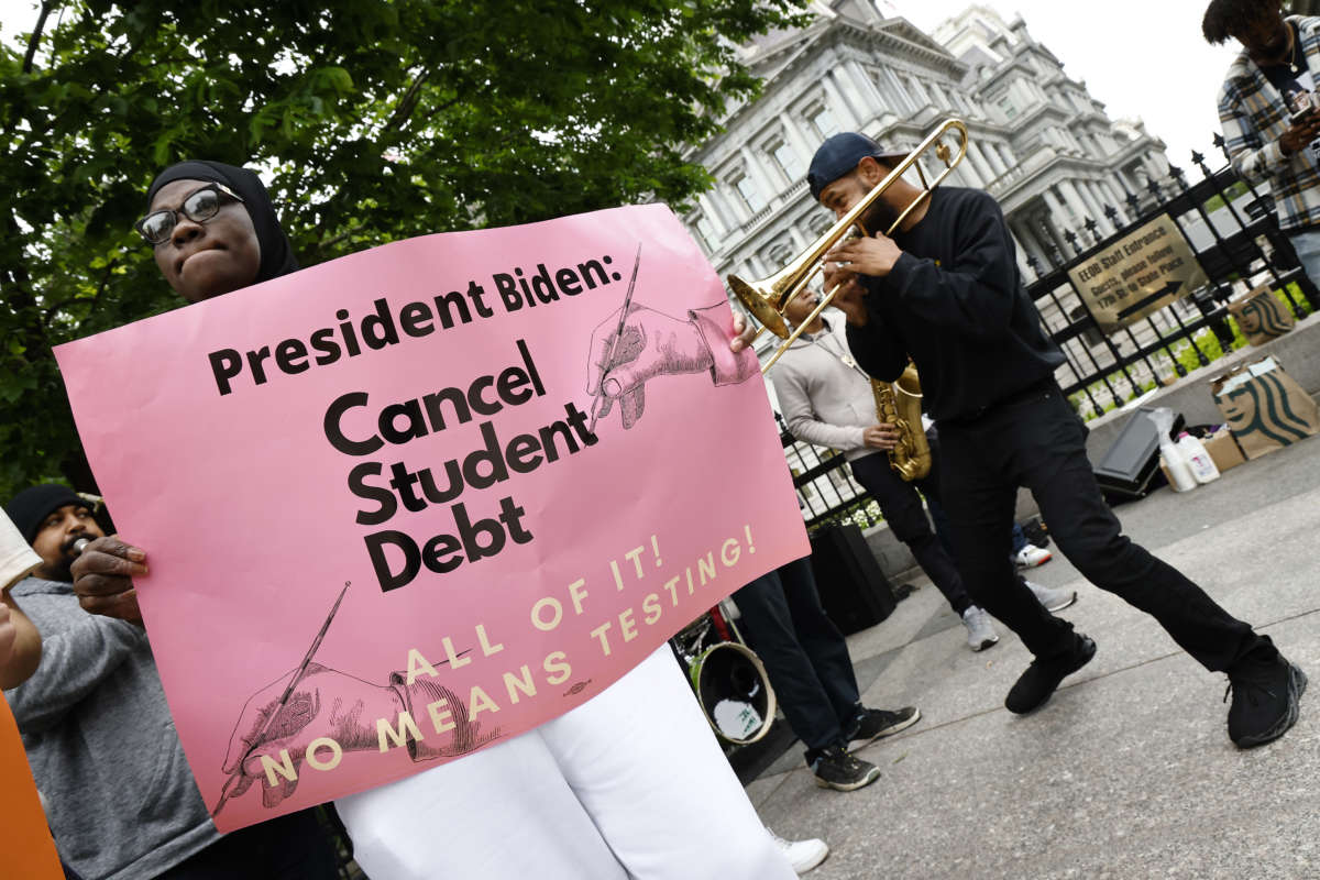 Student loan borrowers gather near The White House to tell President Biden to cancel student debt on May 12, 2020, in Washington, D.C.