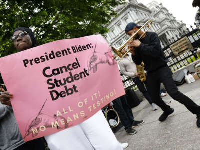 Student loan borrowers gather near The White House to tell President Biden to cancel student debt on May 12, 2020, in Washington, D.C.