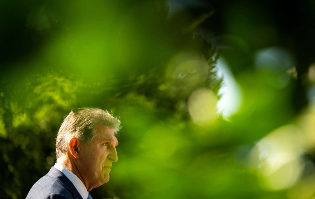 Sen. Joe Manchin speaks to members of the press following the signing of H.R. 5376, the Inflation Reduction Act of 2022, into law in the State Dining Room of the White House on August 16, 2022, in Washington, D.C.